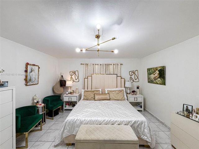 bedroom featuring a chandelier