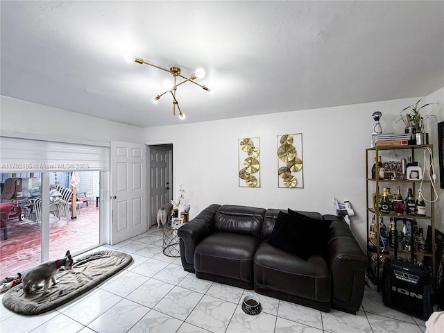 living room with an inviting chandelier