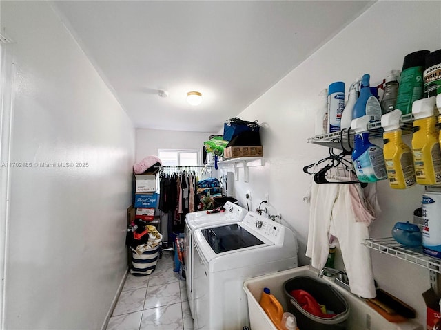 laundry room featuring separate washer and dryer