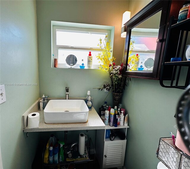 bathroom with walk in shower and toilet