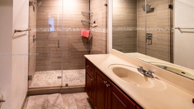 bathroom featuring vanity and walk in shower