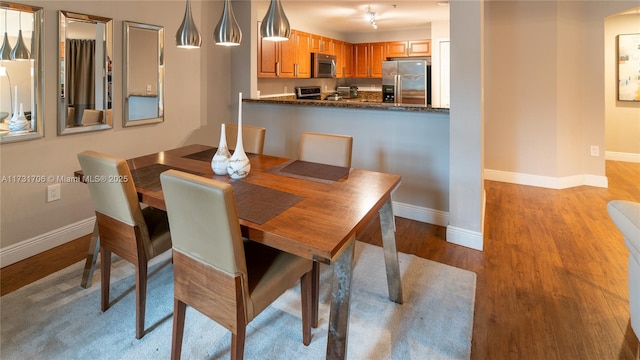 dining room featuring light hardwood / wood-style floors