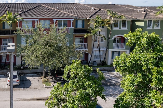 view of property featuring central AC unit