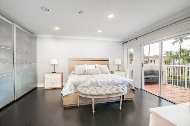 bedroom with access to exterior, crown molding, a textured ceiling, and dark wood-type flooring