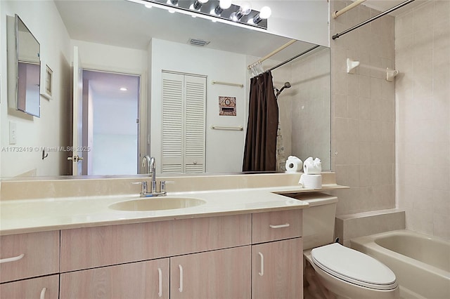 full bathroom with vanity, toilet, and shower / bath combo