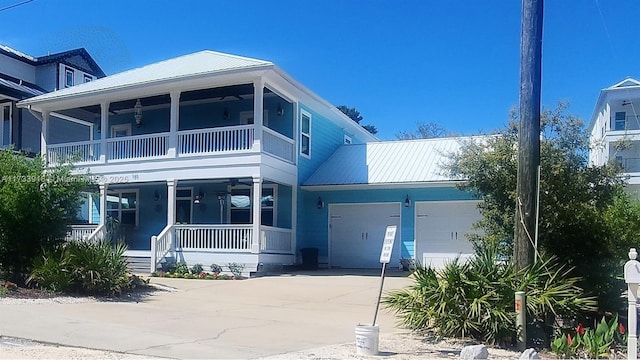 view of front of property featuring a garage and a porch