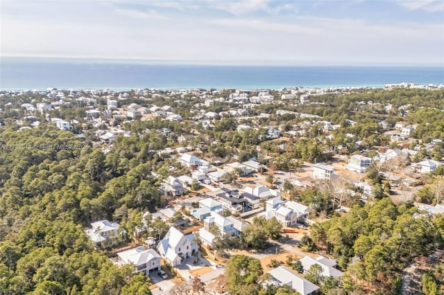 bird's eye view featuring a residential view and a water view