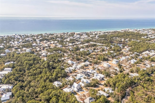 drone / aerial view featuring a water view and a residential view