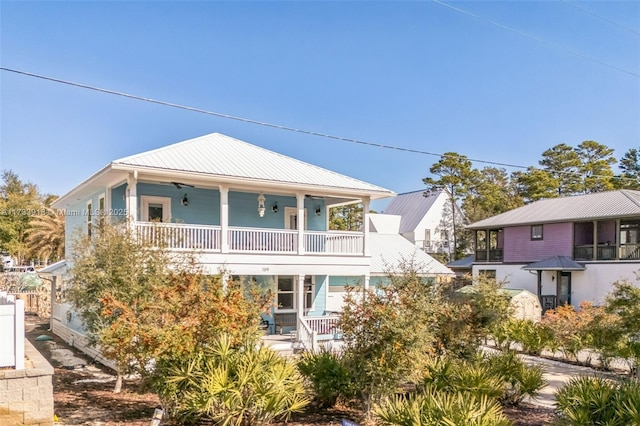 view of front of home featuring a porch and metal roof