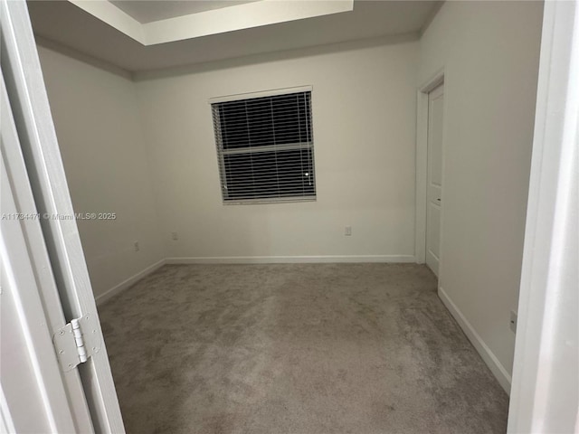 spare room featuring carpet