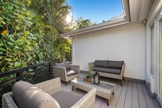 deck featuring outdoor lounge area