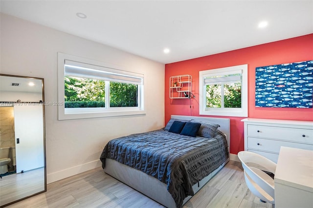 bedroom featuring light hardwood / wood-style flooring