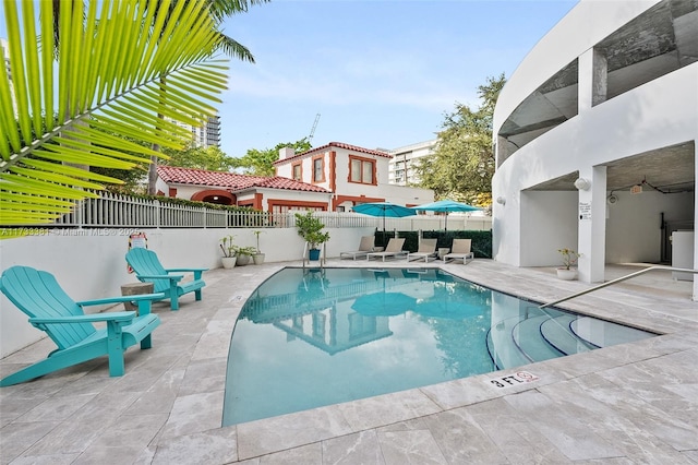 455 NE 25th St Unit 509, Miami, FL 33137 - community pool featuring a fenced backyard and a patio area