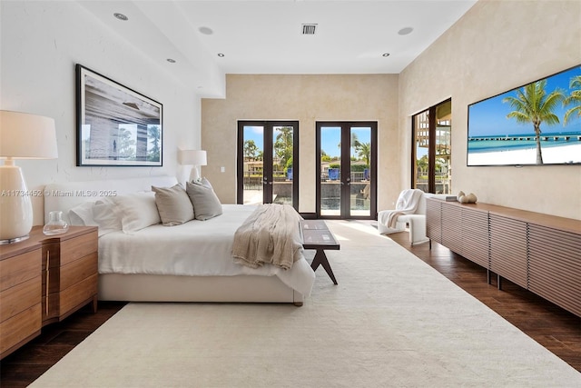 bedroom with french doors, dark wood-style flooring, recessed lighting, visible vents, and access to outside