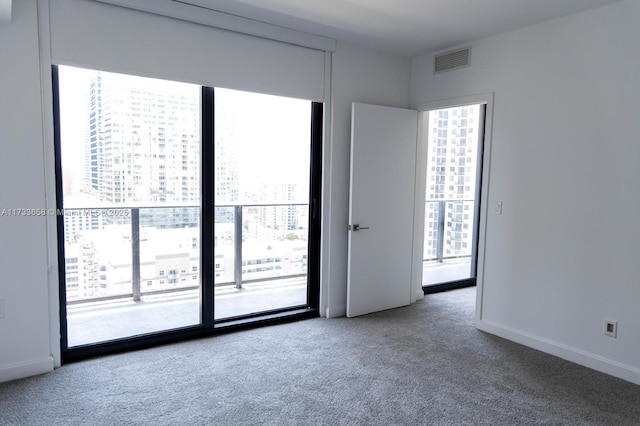 view of carpeted spare room