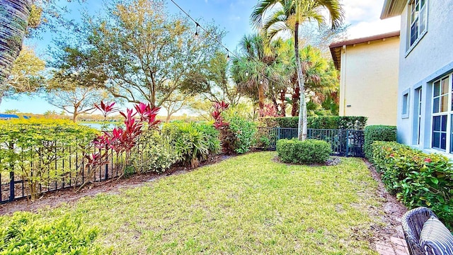 view of yard with fence