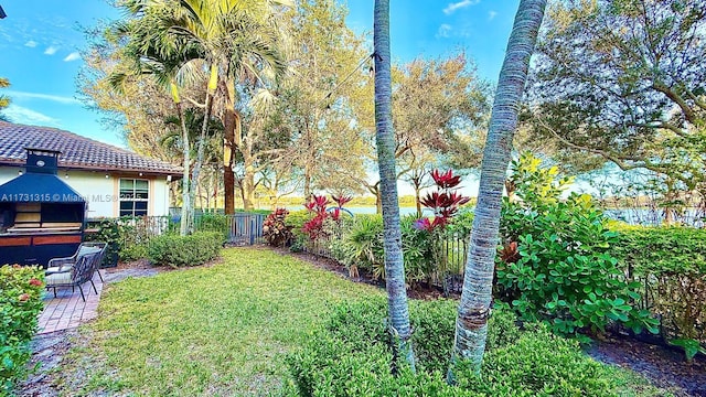 view of yard featuring a patio area and fence