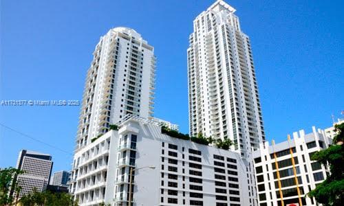 view of building exterior featuring a city view