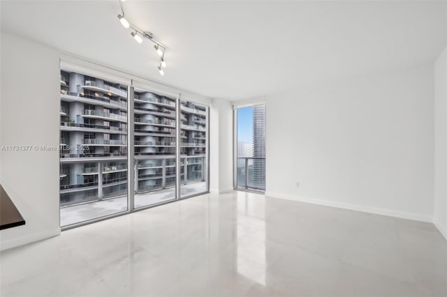 tiled empty room with baseboards