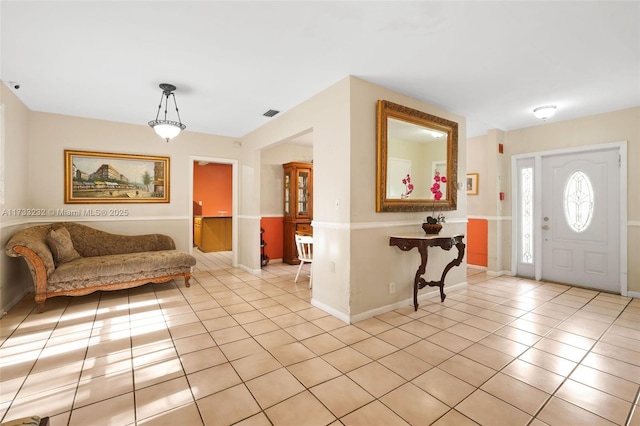 view of tiled entrance foyer