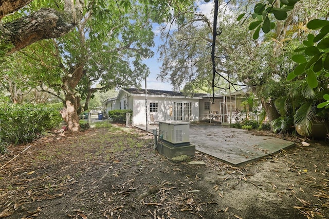 back of property with a patio area