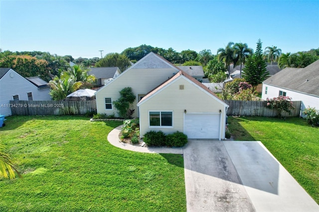 view of front facade featuring a garage and a front yard