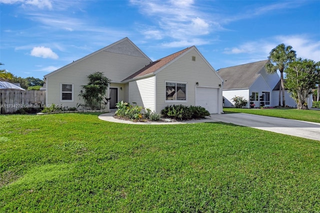 view of front of property with a garage and a front yard