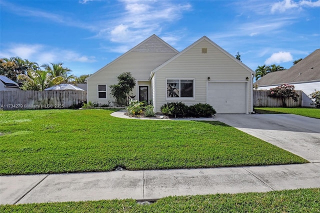 view of front of house with a garage and a front lawn