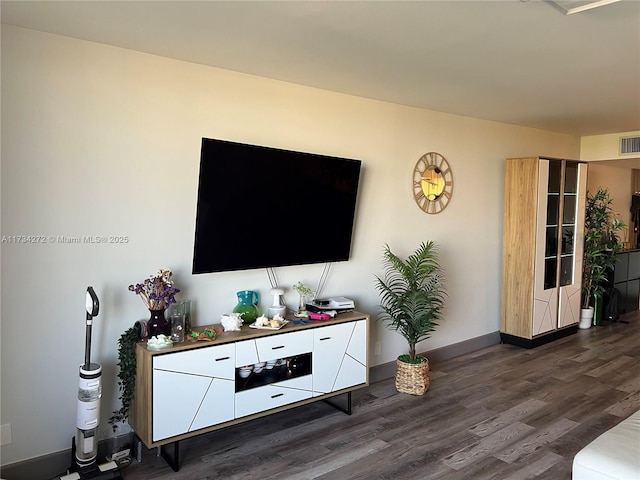 living room featuring dark hardwood / wood-style floors