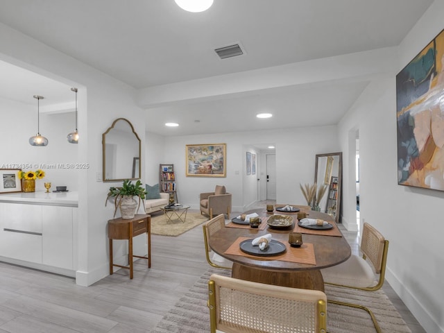 dining room featuring light hardwood / wood-style flooring