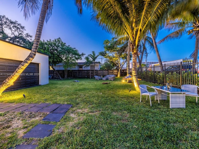 view of yard featuring a garage