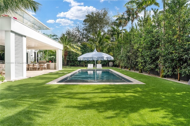 view of pool featuring a patio area, a lawn, a fenced backyard, and a fenced in pool