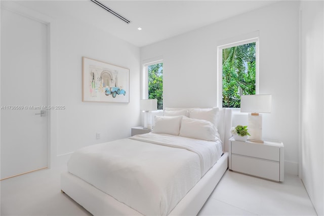 bedroom with recessed lighting