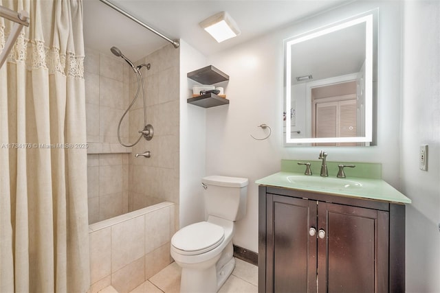 bathroom with a shower with curtain, vanity, toilet, and tile patterned flooring