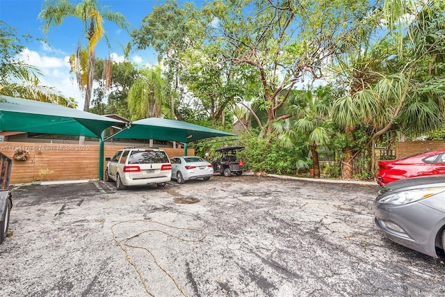 view of parking with a carport