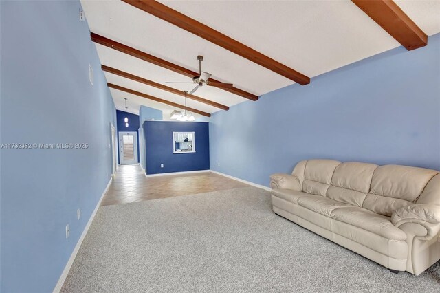 unfurnished living room featuring lofted ceiling with beams, light tile patterned floors, and ceiling fan