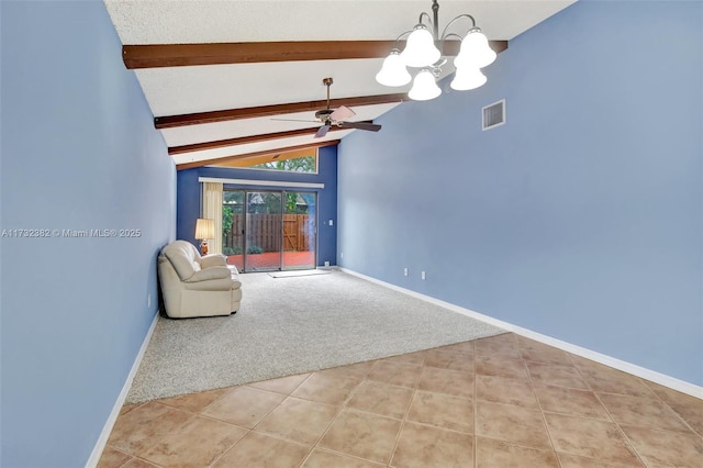 interior space featuring vaulted ceiling with beams, ceiling fan with notable chandelier, and light colored carpet