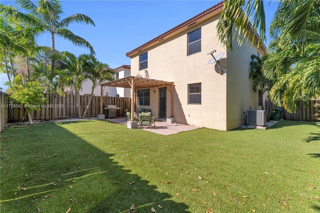 rear view of house with a pergola, central AC, a patio, and a lawn