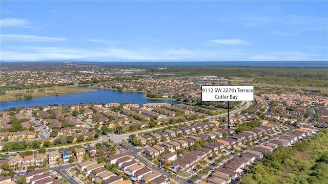 aerial view featuring a water view