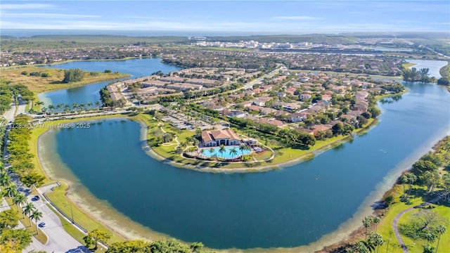 bird's eye view with a water view