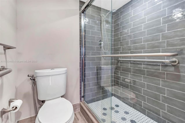 1401 SW 128th Ter Unit 307H, Pembroke Pines, FL 33027 - full bath featuring baseboards, a stall shower, and toilet