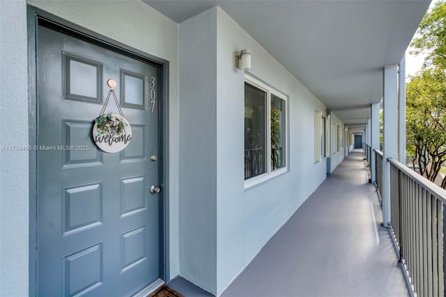 1401 SW 128th Ter Unit 307H, Pembroke Pines, FL 33027 - property entrance featuring stucco siding