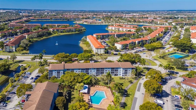 drone / aerial view with a water view