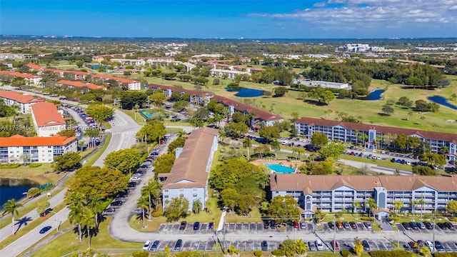 1401 SW 128th Ter Unit 307H, Pembroke Pines, FL 33027 - birds eye view of property featuring a water view and view of golf course
