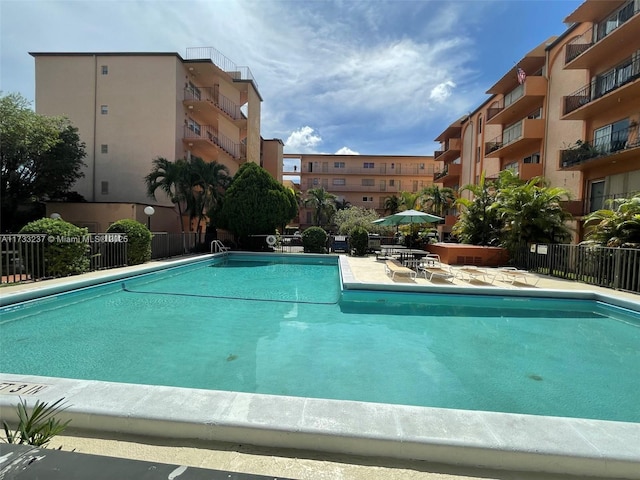 view of swimming pool featuring a patio area