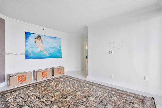 empty room featuring crown molding