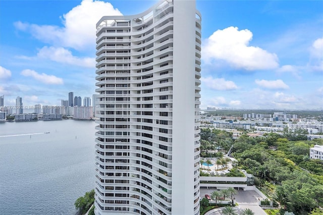 view of building exterior featuring a water view