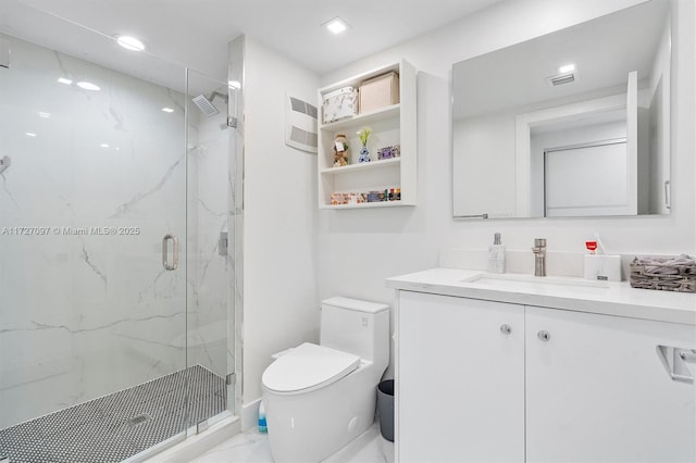 bathroom featuring walk in shower, vanity, and toilet