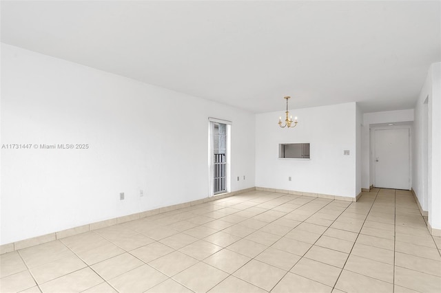 unfurnished living room featuring light tile patterned floors and a notable chandelier