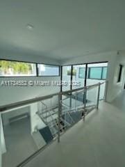 interior space featuring finished concrete flooring